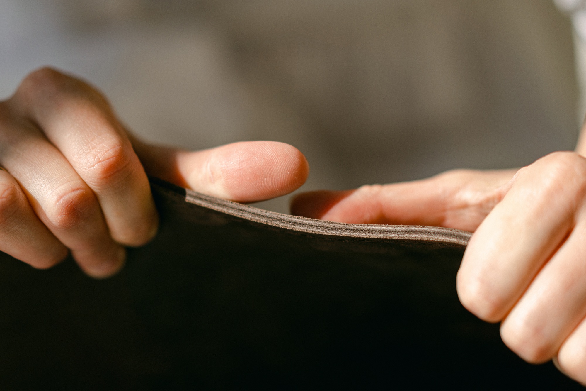 Artisan handmade folding chair with earthy leather design