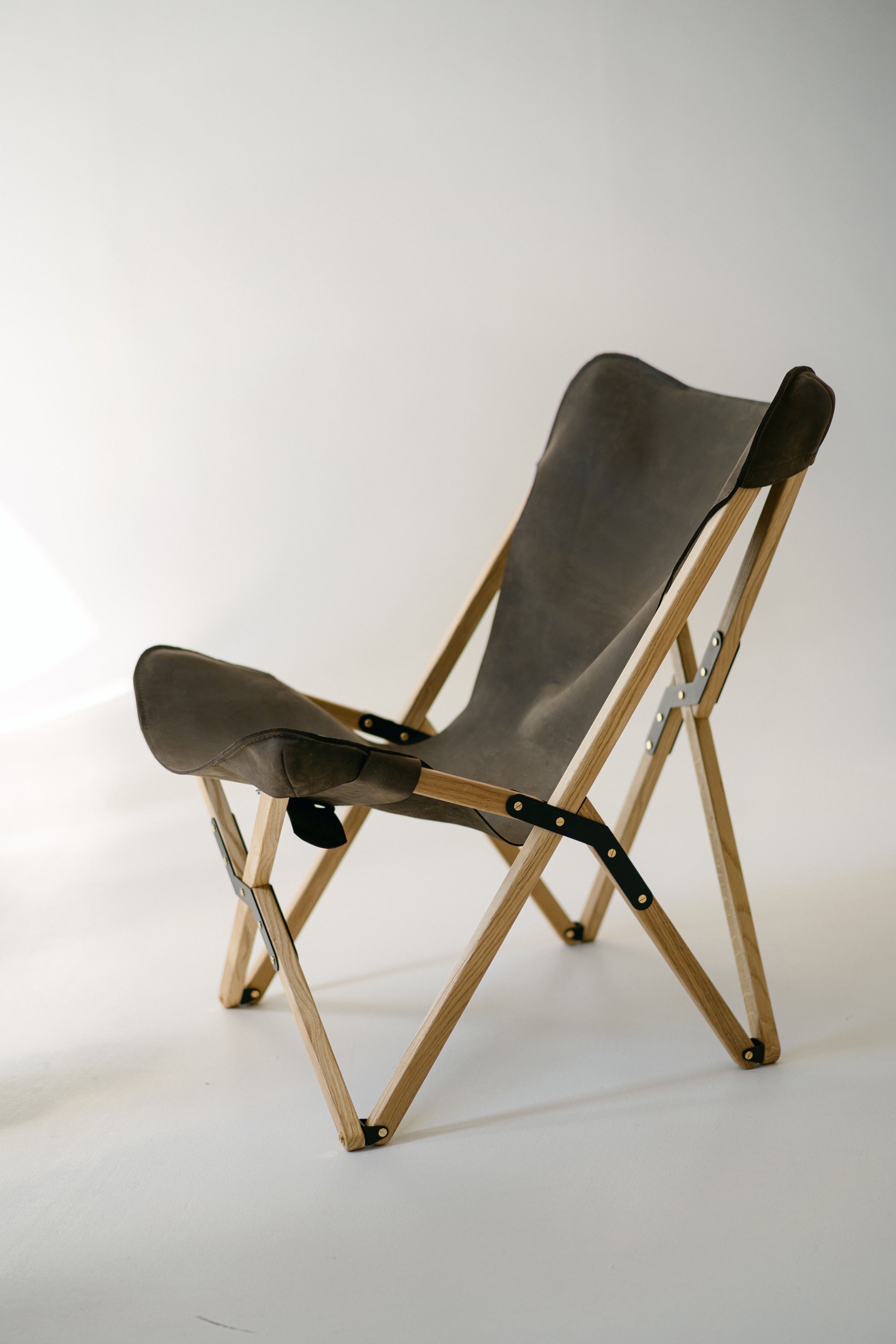 Modern handcrafted oak and leather lounge chair